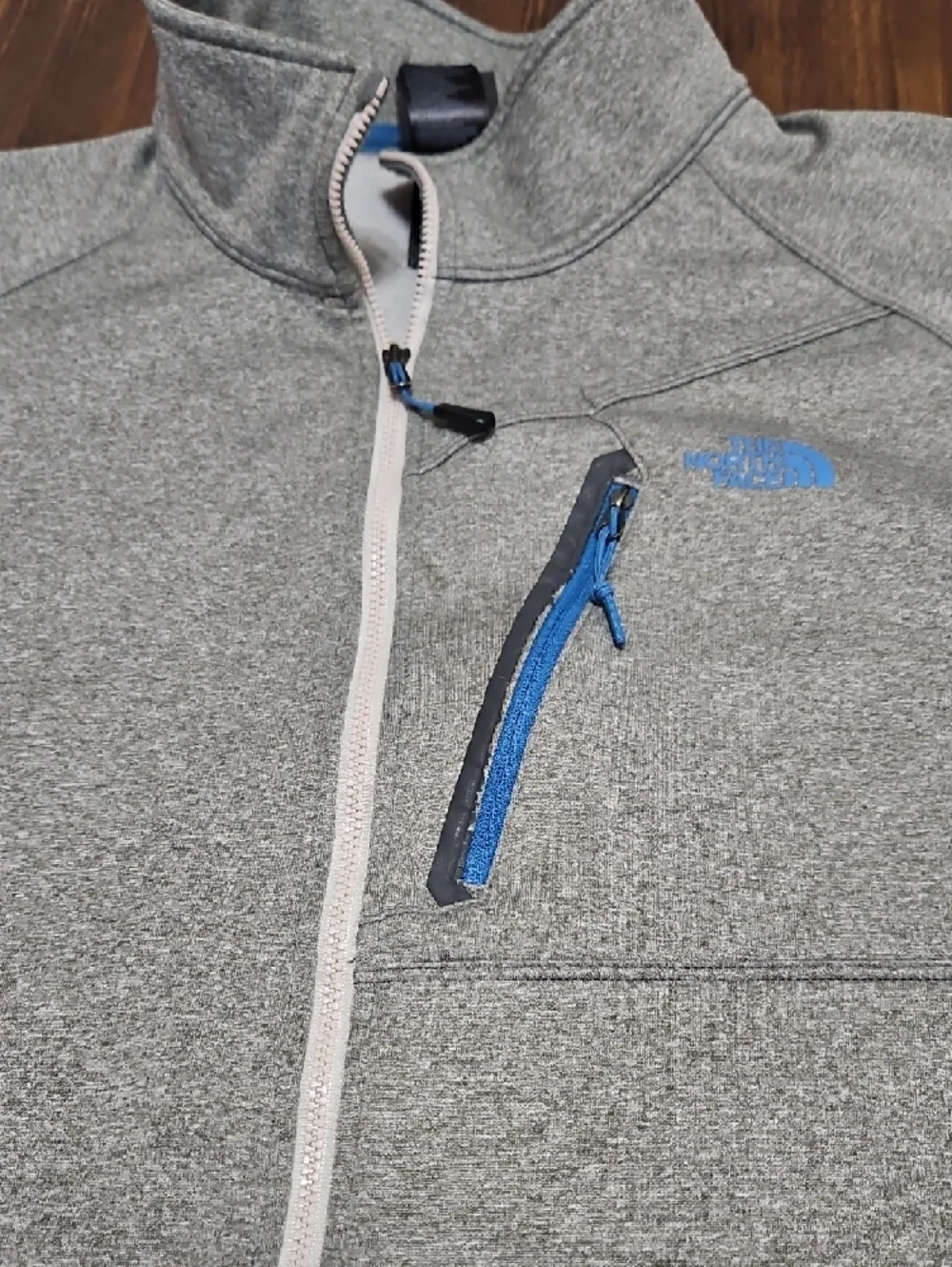 The North Face Men's Heather Gray Fleece Jacket with Blue Accents